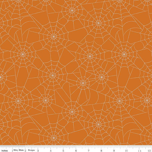 Bad To The Bone Spiderwebs Orange Sparkle By the yard