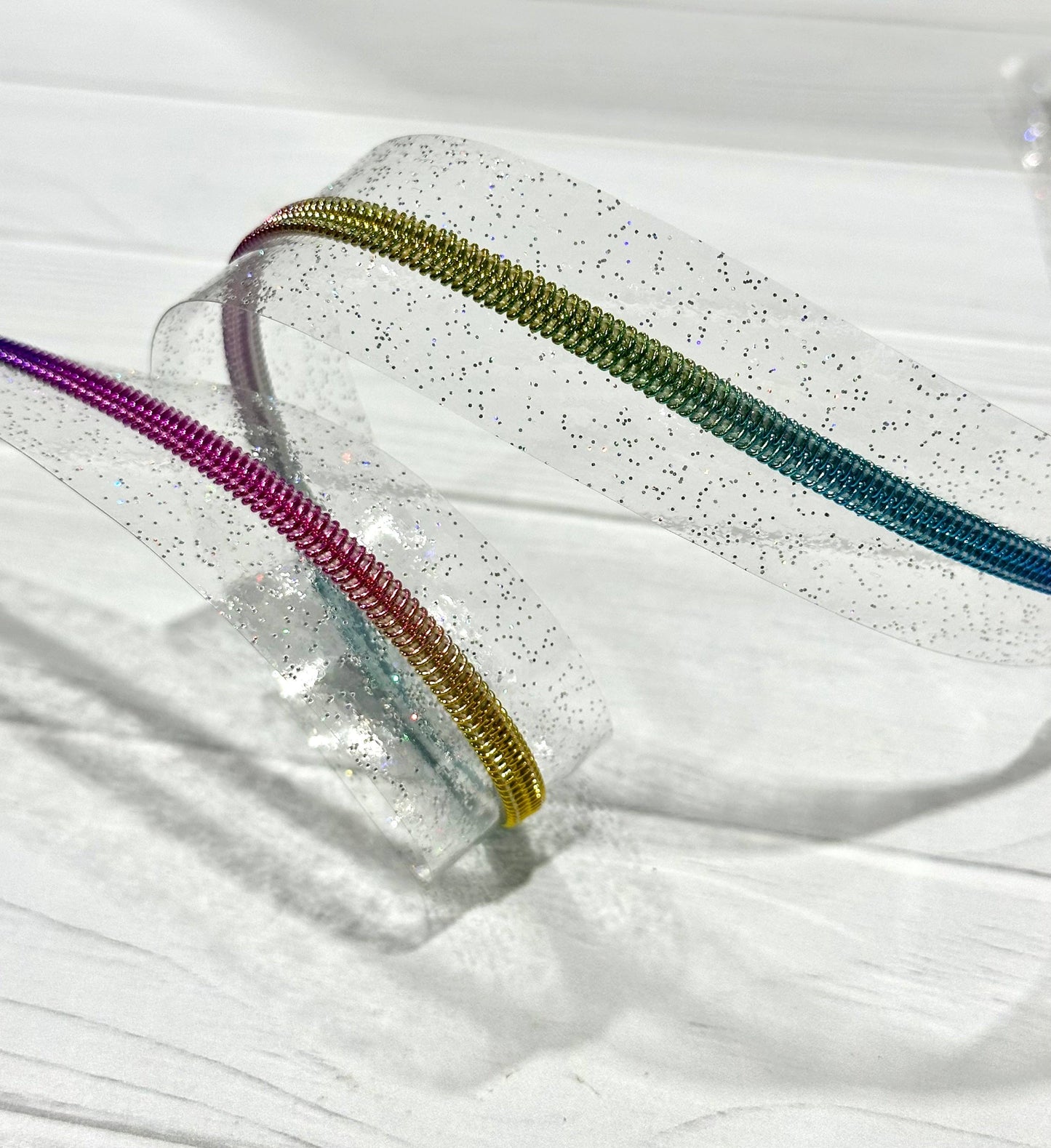 Wonderground Fabrics and Crafts - Clear holographic sparkle vinyl zipper tape with rainbow teeth